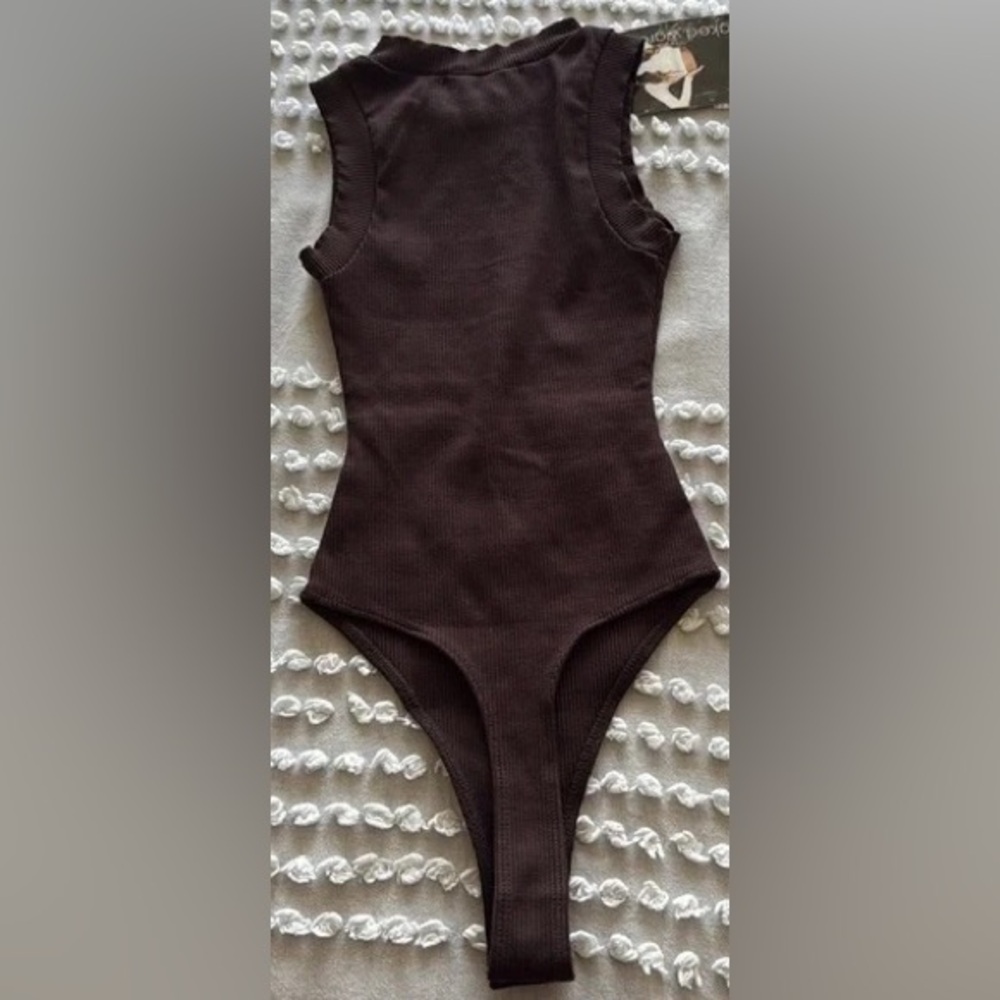 NAKED WARDROBE Sleeveless Ribbed Crewneck Bodysuit